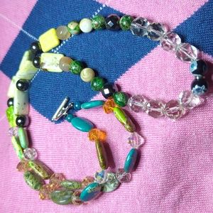 Handmade one a of kind necklace from ("Holmes creations") the casual edition.